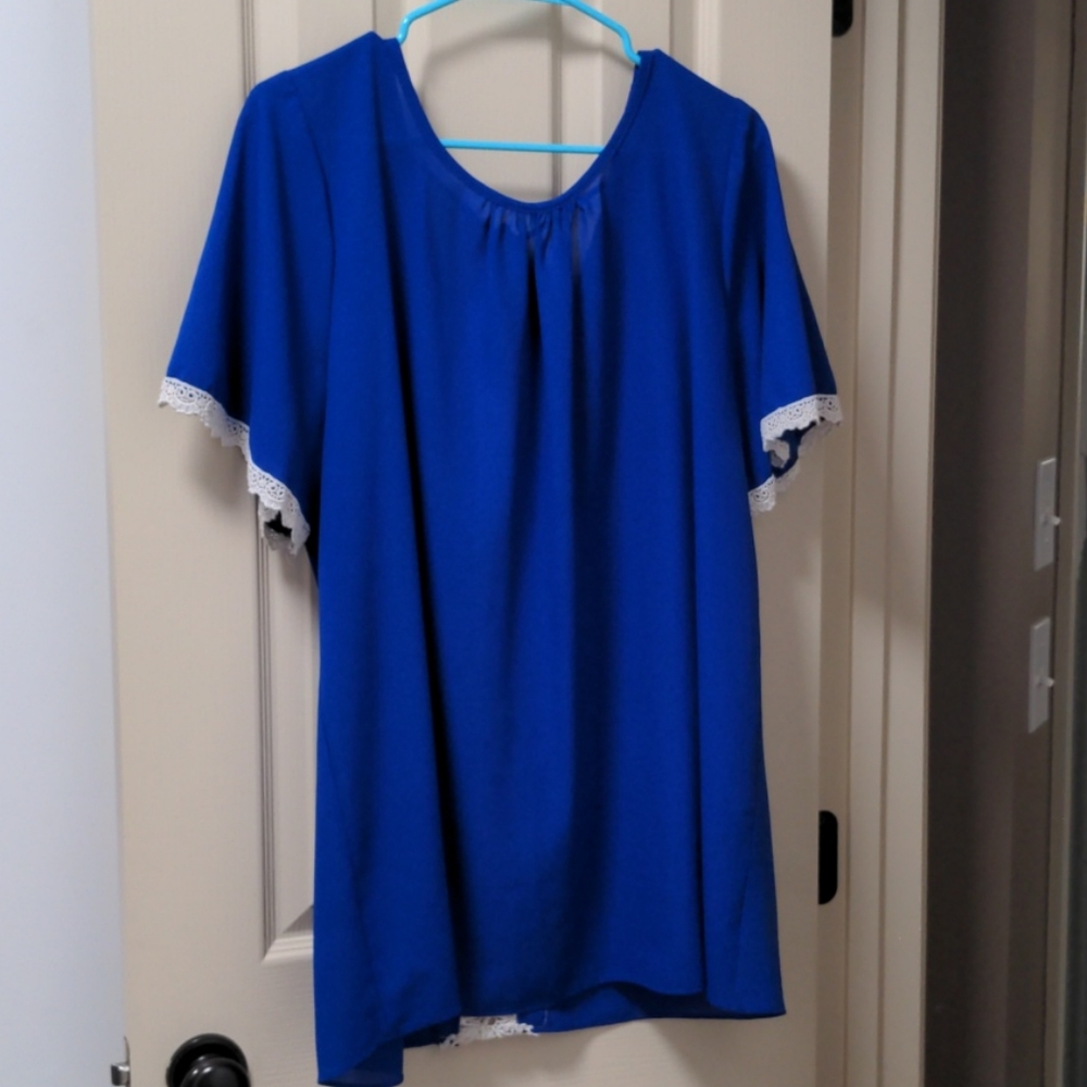 Blue blouse with white crochet